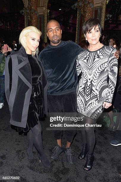 Kim Kardashian, Kanye West and Kris Jenner attend the Balmain show as part of the Paris Fashion Week Womenswear Fall/Winter 2015/2016 on March 5,...