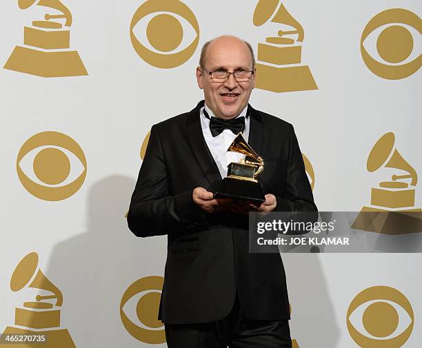 Composer Wlodek Pawlik, winner of Best Large Jazz Ensemble Album for "Night In Calisia", poses in the press during the 56th Grammy Awards at the...