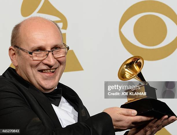 Composer Wlodek Pawlik, winner of Best Large Jazz Ensemble Album for "Night In Calisia", poses in the press during the 56th Grammy Awards at the...