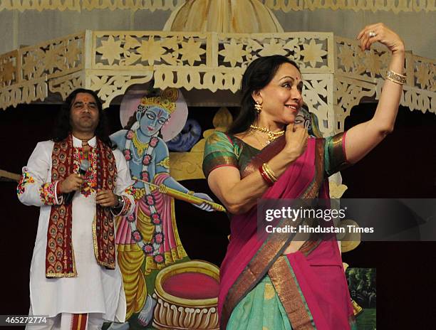 Bollywood actress and BJP MP from Mathura, Hema Malini takes part in the Holi celebration programme at CGA ground near Karkardooma Court on March 5,...