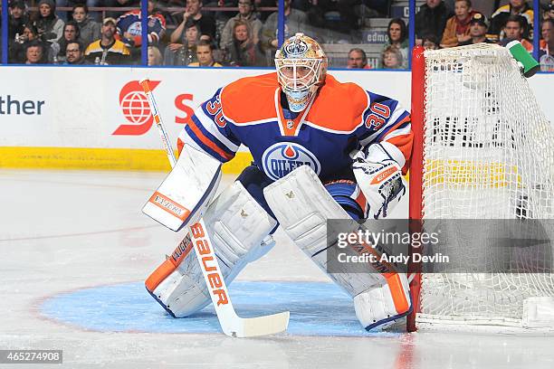 Ben Scrivens of the Edmonton Oilers prepares to make a save during the game against the Boston Bruins on February 18, 2015 at Rexall Place in...