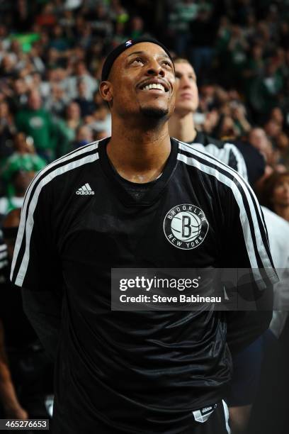 Paul Pierce of the Brooklyn Nets looks up at the video tribute during a time out against the Boston Celtics on January 26, 2014 at the TD Garden in...