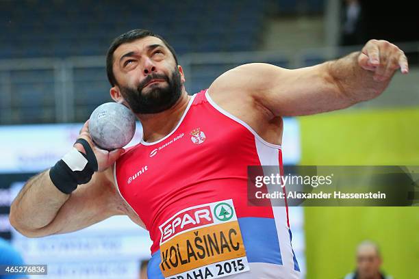 Asmir Kolasinac of Serbia competes in the Men's Shot Put qualification during 2015 European Athletics Indoor Championships at O2 Arena on March 5,...