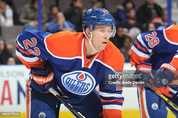 Keith Aulie of the Edmonton Oilers lines up for a face off during the game against the Minnesota Wild on February 20, 2015 at Rexall Place in...