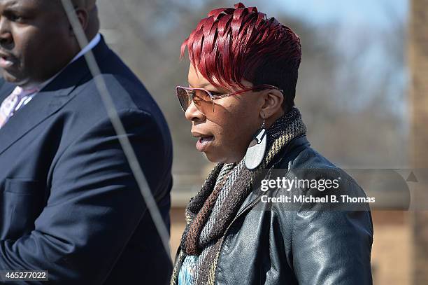 Lesley McSpadden, mother of slain teenager Michael Brown Jr., exits after a press conference at the Greater St. Mark Missionary Baptist Church on...