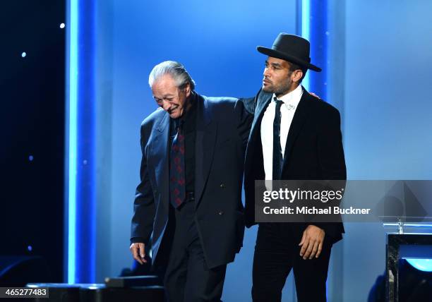 Musicians Charlie Musselwhite and Ben Harper accept the Best Blues Album award for 'Get Up!' onstage onstage during the 56th GRAMMY Awards...