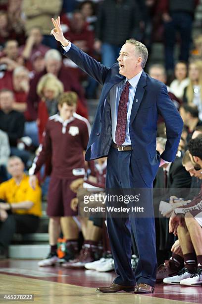 Head Coach Billy Kennedy of the Texas A&M Aggies signals to his team during a game against the Arkansas Razorbacks at Bud Walton Arena on February...