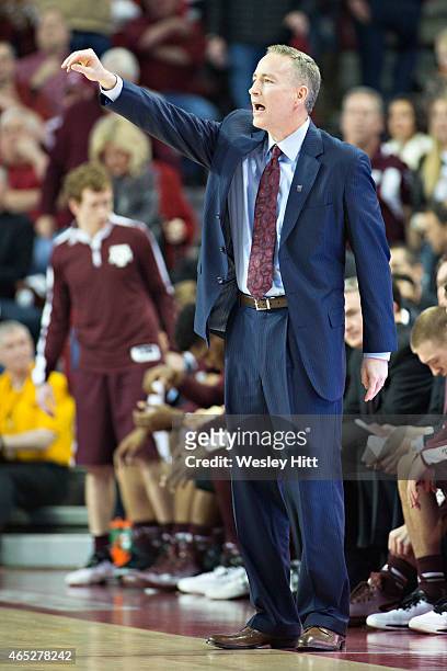 Head Coach Billy Kennedy of the Texas A&M Aggies signals to his team during a game against the Arkansas Razorbacks at Bud Walton Arena on February...