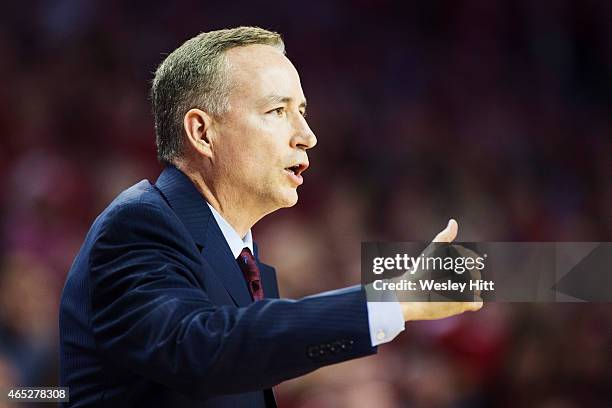 Head Coach Billy Kennedy of the Texas A&M Aggies signals to his team during a game against the Arkansas Razorbacks at Bud Walton Arena on February...