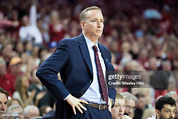 Head Coach Billy Kennedy of the Texas A&M Aggies watches his team during a game against the Arkansas Razorbacks at Bud Walton Arena on February 24,...