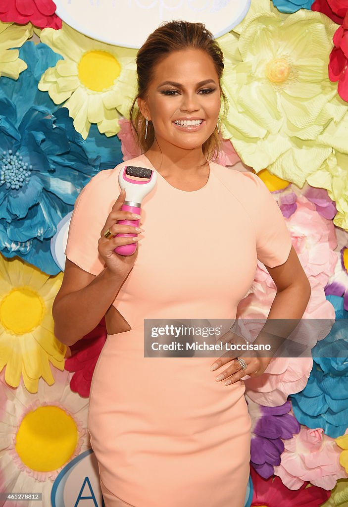 Chrissy Teigen "Glass-Slipper-Ready" Pedicure Event