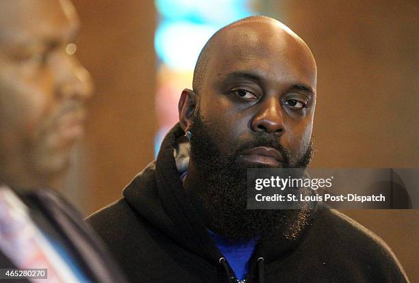 Michael Brown Sr. Listened, but did not speak during the press conference on Thursday, March 5 at the Greater St. Marks Family Church in Dellwood,...