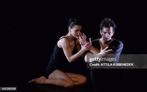 Dancers of the Hungarian contemporary dance group, the 'Kulcsar Noemi Tellabor' perform on the stage of the MOM culture center of the National Dance...