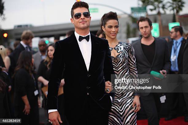 Recording artist Robin Thicke and actress Paula Patton attend the 56th GRAMMY Awards at Staples Center on January 26, 2014 in Los Angeles, California.