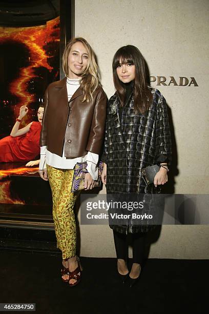 Alexandra Golovanoff and Miroslava Duma attend Prada The Iconoclasts, Paris 2015 on March 5, 2015 in Paris, France.