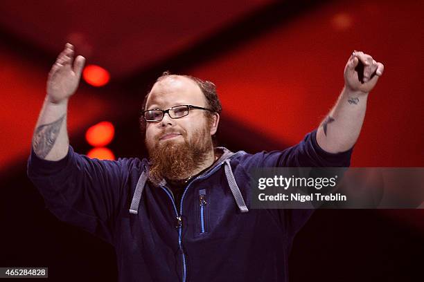 Singer Andreas Kuemmert reacts during the finals of the TV show 'Our Star For Austria' on March 5, 2015 in Hanover, Germany. 'Our Star For Austria'...