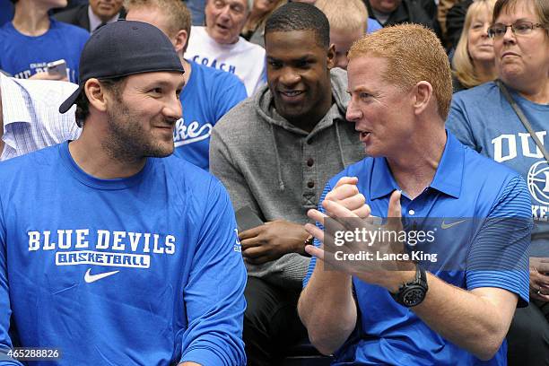 Quarterback Tony Romo, running back DeMarco Murray and head coach Jason Garrett of the Dallas Cowboys attend the game between the Wake Forest Demon...