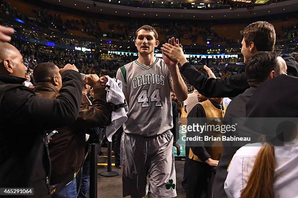 Tyler Zeller of the Boston Celtics leaves the court after a game against the Utah Jazz on March 4, 2015 at TD Garden in Boston, Massachusetts. NOTE...