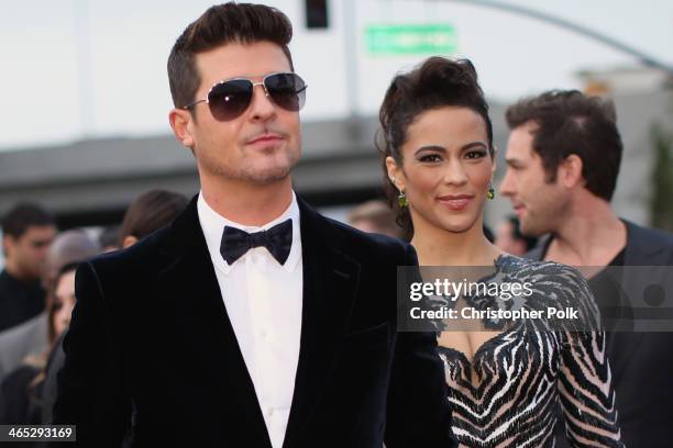 Singer Robin Thicke and actress Paula Patton attend the 56th GRAMMY Awards at Staples Center on January 26, 2014 in Los Angeles, California.