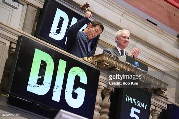 Actor Jason Isaacs and Jim Byrne, Client Services Manager at NYSE, ring the NYSE Closing Bell at New York Stock Exchange on March 5, 2015 in New York...
