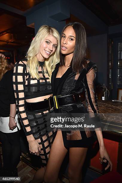 Devon Windsor and Cindy Bruna attend the Balmain Aftershow Dinner as part of the Paris Fashion Week Womenswear Fall/Winter 2015/2016 on March 5, 2015...