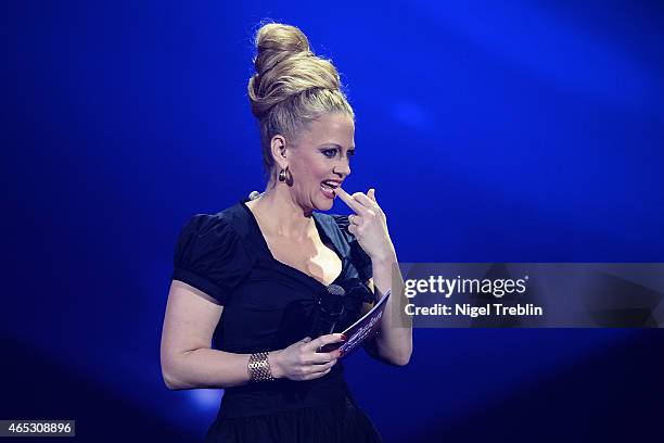 Host Barbara Schoeneberger performs during the finals of the TV show 'Our Star For Austria' on March 5, 2015 in Hanover, Germany. 'Our Star For...