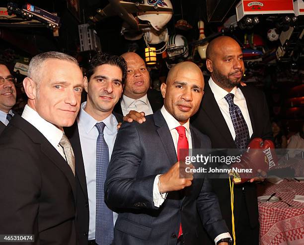 Michael Yormark, David Iskowitz, Shawn 'Pecas' Costner, Miguel Cotto, and "OG" Juan Perez attend the announcement of Miguel Cotto's partnership with...