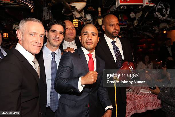 Michael Yormark, David Iskowitz, Shawn 'Pecas' Costner, Miguel Cotto, and "OG" Juan Perez attend the announcement of Miguel Cotto's partnership with...