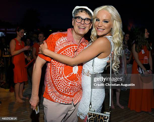 Rolf Scheider and Gina Lisa Lohfink attend the Langnese 80th Anniversary Celebration at Beach Centre Wandsbek on March 5, 2015 in Hamburg, Germany.