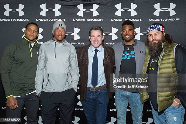 Anthony Walters, Kyle Fuller, Kevin Plank, Manteo Mitchell, and Willie Robertson attend Under Armour opens largest brand house on Chicago's...