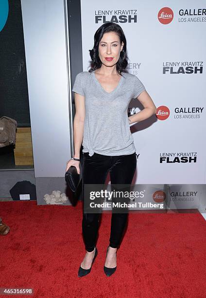 Actress Amber Melfi attends the launch of the "Flash By Lenny Kravitz" photo exhibit held at Leica Gallery Los Angeles on March 5, 2015 in Los...