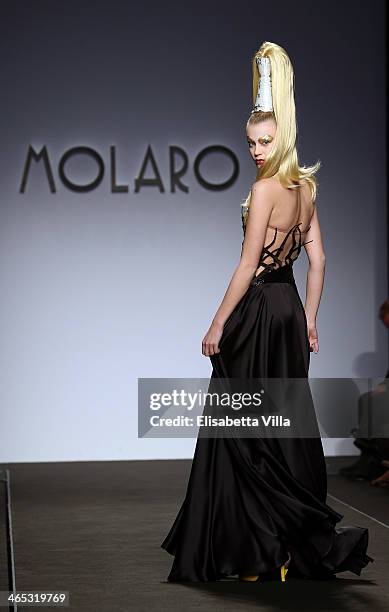 Model walks the runway during Gianni Molaro S/S 2014 Art Couture colletion fashion show as part of AltaRoma AltaModa Fashion Week at Santo Spirito In...