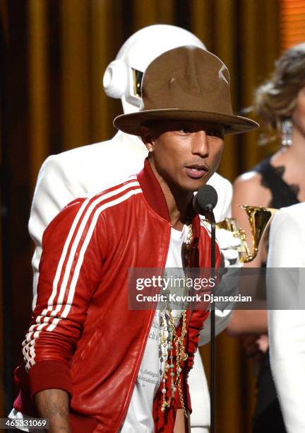 Musician Pharrell Williams accepts the Record of the Year award for 'Get Lucky' onstage during the 56th GRAMMY Awards at Staples Center on January...