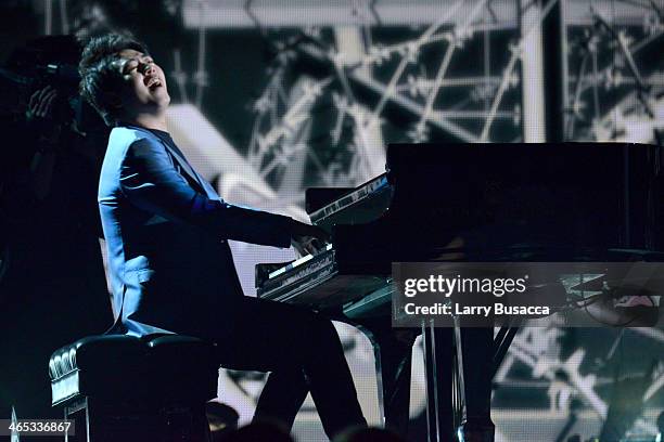 Pianist Lang Lang performs onstage during the 56th GRAMMY Awards at Staples Center on January 26, 2014 in Los Angeles, California.