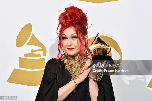 Singer/songwriter Cyndi Lauper, winner of the Best Musical Theater Album award for "Kinky Boots", poses in the press room during the 56th GRAMMY...