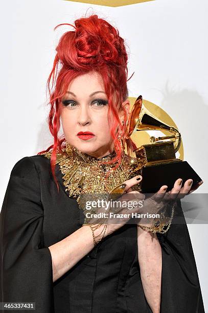 Singer/songwriter Cyndi Lauper, winner of the Best Musical Theater Album award for "Kinky Boots", poses in the press room during the 56th GRAMMY...