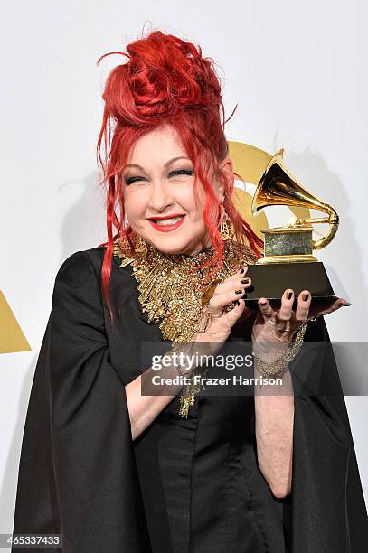 Singer/songwriter Cyndi Lauper, winner of the Best Musical Theater Album award for "Kinky Boots", poses in the press room during the 56th GRAMMY...