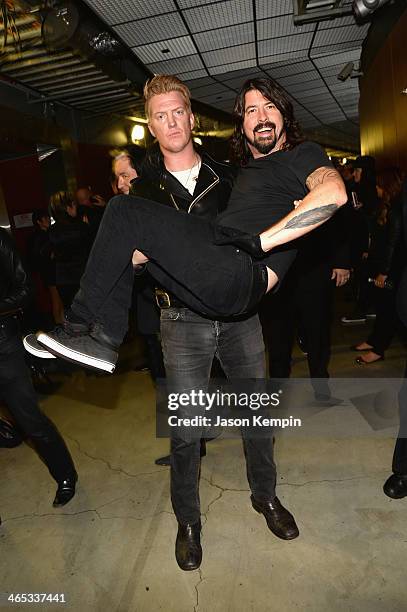 Josh Homme of Queens of the Stone Age and Dave Grohl of Foo Fighters attends the 56th GRAMMY Awards at Staples Center on January 26, 2014 in Los...