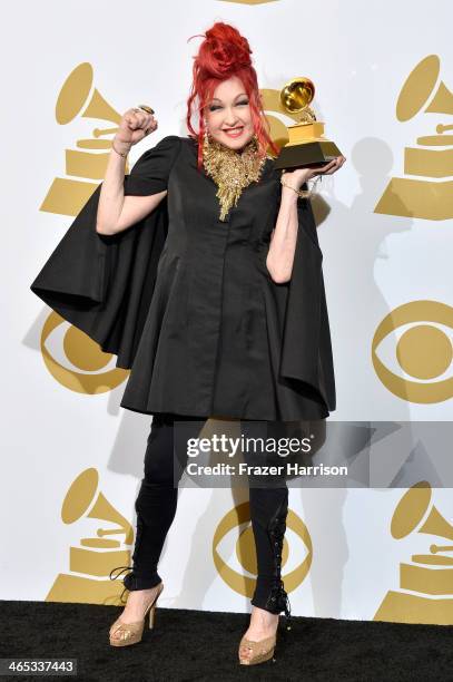 Singer/songwriter Cyndi Lauper, winner of the Best Musical Theater Album award for "Kinky Boots", poses in the press room during the 56th GRAMMY...