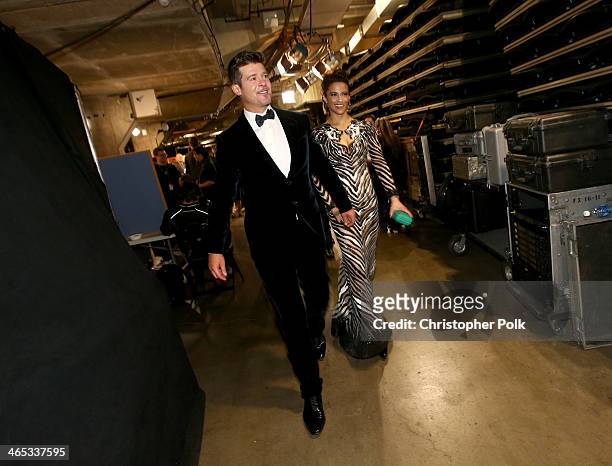 Singer Robin Thicke and actress Paula Patton attend the 56th GRAMMY Awards at Staples Center on January 26, 2014 in Los Angeles, California.