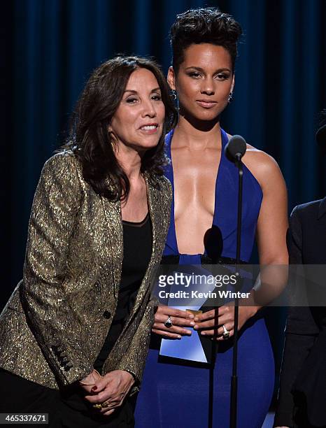 Olivia Harrison and singer Alicia Keys speak onstage during the 56th GRAMMY Awards at Staples Center on January 26, 2014 in Los Angeles, California.