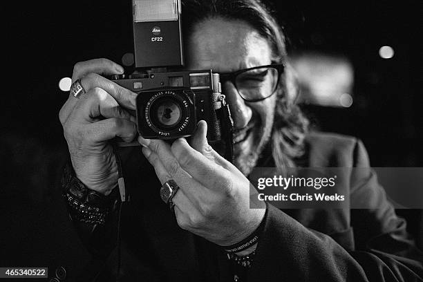 An unidentified guest attends "Flash" by Lenny Kravitz presented by Leica at Leica Store LA on March 5, 2015 in Los Angeles, California.