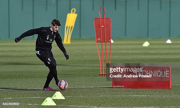 Steven Gerrard of Liveprool in action during a training session at Melwood Training Ground on March 6, 2015 in Liverpool, England.