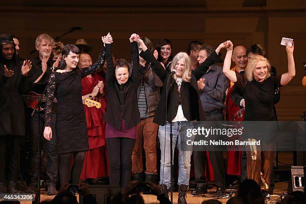 Jesse Paris Smith, Laurie Anderson, Patti Smith and Debbie Harry perform on stage at the Tibet House Benefit Concert 2015 at Carnegie Hall on March...