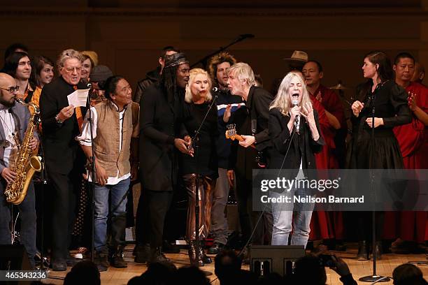 Patti Smith and musicians perform on stage at the Tibet House Benefit Concert 2015 at Carnegie Hall on March 5, 2015 in New York City.