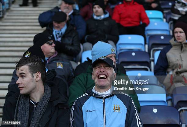 Fans look on during the UEFA Youth League Round of 16 match between Manchester City FC and FC Schalke 04 at City Football Academy on February 24,...