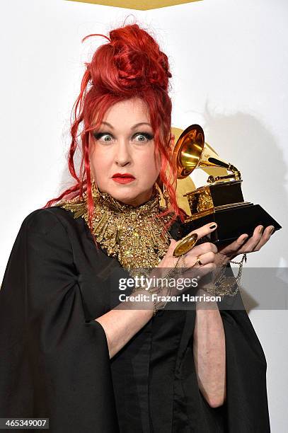 Singer/songwriter Cyndi Lauper, winner of the Best Musical Theater Album award for "Kinky Boots", poses in the press room during the 56th GRAMMY...