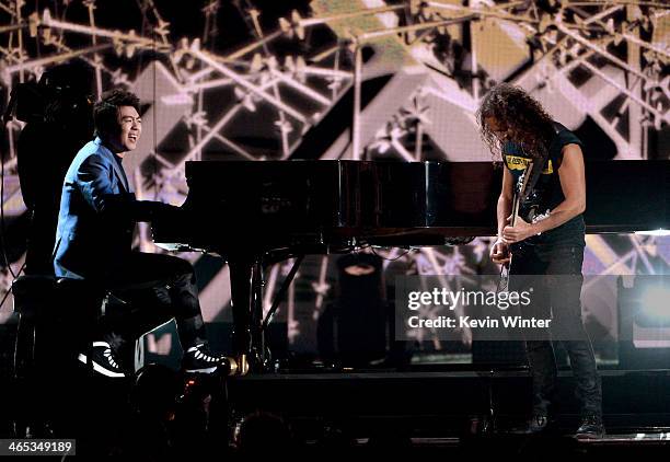 Musicians Lang Lang and Kirk Hammett perform onstage during the 56th GRAMMY Awards at Staples Center on January 26, 2014 in Los Angeles, California.