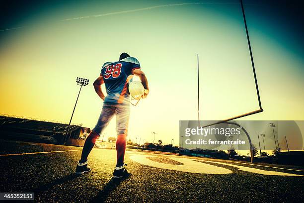 american football player - touchdown stock pictures, royalty-free photos & images