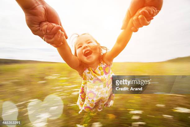 spinning girl - child and unusual angle stockfoto's en -beelden